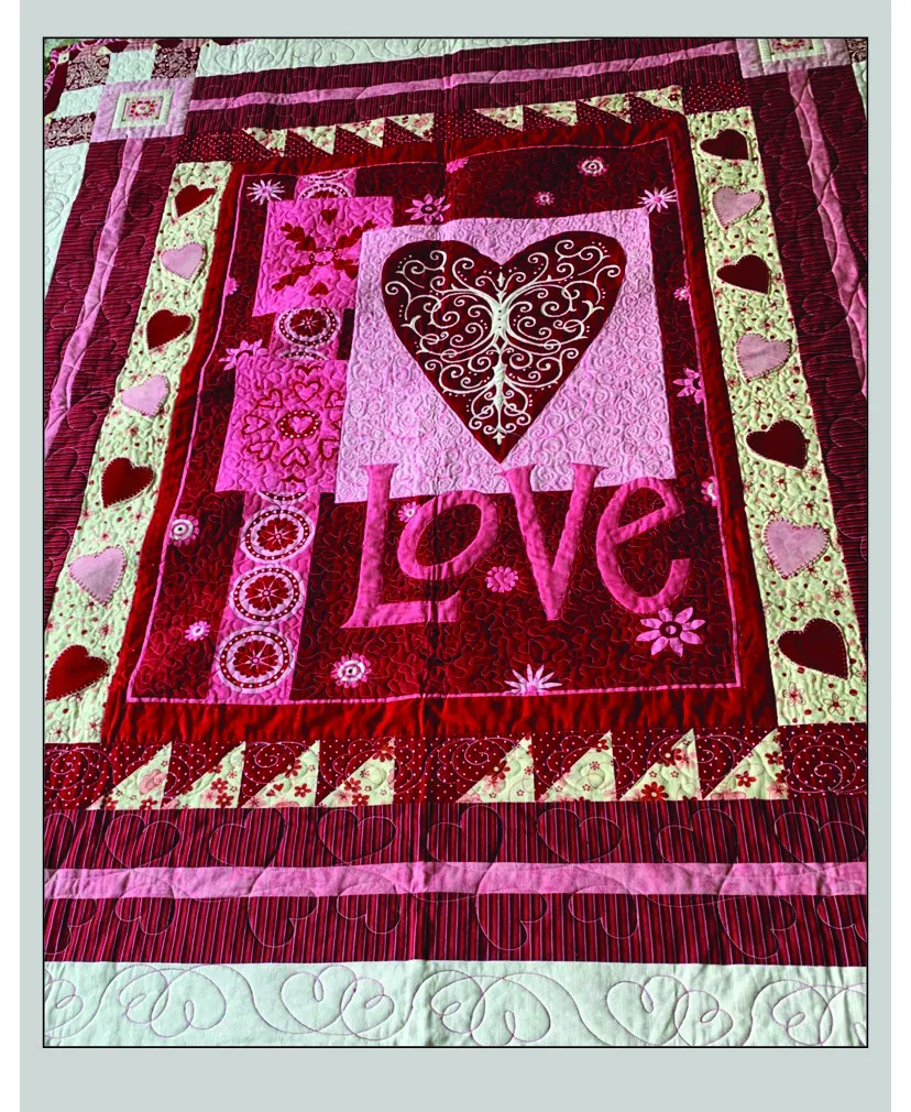 Red and pink heart-themed 'Love' quilt with custom digital quilting